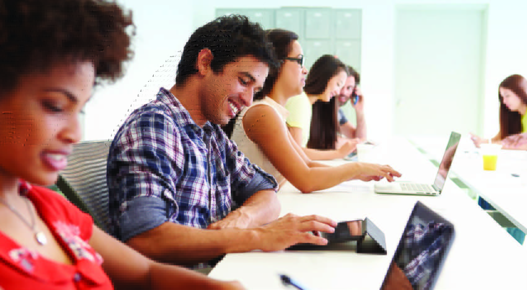 Several people checking email on multiple devices Several people checking email on multiple devices